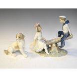 Lladro figure group - See Saw, together with a Nao figure of a seated dog Condition: