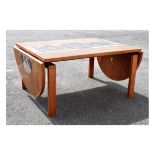 1970's Danish Trioh Ox Art teak and tile top inset dining room table, the rectangular top with D