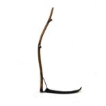 Rustic scythe with iron blade and ash handle Condition: