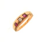 Victorian 18ct gold gypsy ring set central diamond flanked by a red stone to either side, hallmarked