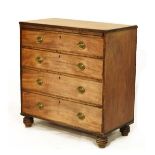 George III mahogany chest of four long cock beaded drawers with oval brass back plate bale handles