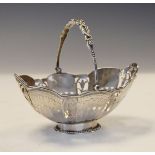 George III silver sweetmeat basket of wavy topped oval design with swing handle, London 1791, 4.4ozt
