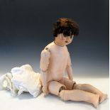 1930's period composition doll having a jointed body Condition: