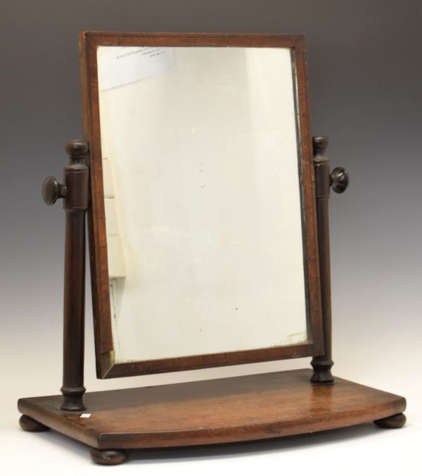 Early 19th Century mahogany swing dressing mirror with rectangular plate between turned uprights