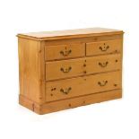 Pine chest of two short over two long drawers on plinth base Condition: