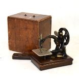 Late 19th Century Willcox & Gibbs cast metal sewing machine with original gilt decorated finish