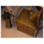 Arts & Crafts style hammer brass log bin having a hinged rectangular cover with studded strap work