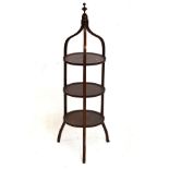 Early 20th Century string inlaid mahogany three tier cake stand standing on splayed supports