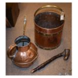 Brass and copper log bin of cylindrical form with rolled rim over studded brass bands with brass