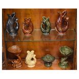 Five Dartmouth Pottery fish gurgle jugs, together with three similar bowls/comports Condition: