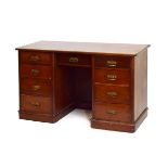 Victorian mahogany kneehole dressing table, the moulded oblong top over two banks of four