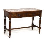 Late Victorian oak side table having a panelled oblong top over two frieze drawers on ring turned