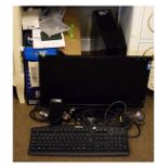 PC home computer with Hanns-G LCD monitor, Dell keyboard, Logitech speakers and hard drive, and