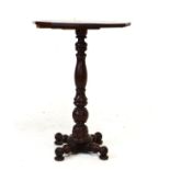 Victorian mahogany occasional table having a twelve sided top on turned stem and four turned