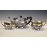Edward VII silver three piece tea service, comprising: teapot, two handled sugar basin and milk jug,