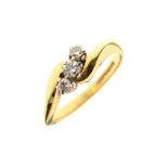 18ct gold three stone diamond crossover ring, size N, 4.3g approx gross Condition: