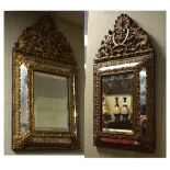 Pair of late 19th Century Flemish style wall mirrors, each having a gilt metal scroll cresting