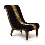 Victorian rosewood-framed deep buttoned nursing chair with floral tapestry panel to seat and back