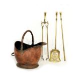 Brass three piece companion set comprising: pierced shovel, tongs and poker, together with a