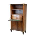 William IV mahogany secretaire bookcase of inverted breakfront design with two shelves having reeded