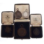Small quantity of 1920's period boxing and athletics prize medallions awarded to Corporal E.C.