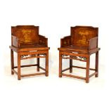 Pair of Chinese hall chairs, each having pen work decoration, panelled seat and standing on square