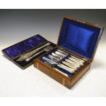 Pair of Victorian engraved silver plated fish servers, cased, together with a part set of