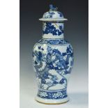 19th Century Chinese export baluster shaped vase and cover having blue and white painted