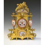 19th Century French gilt spelter and porcelain mantel clock, the pink porcelain dial with Roman