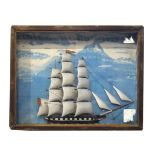 Painted wooden diorama depicting a three masted sailing ship in glazed case Condition: