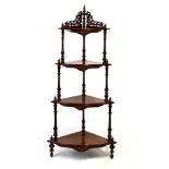 Victorian inlaid figured walnut four tier corner what-not, standing on turned supports Condition: