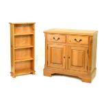 Pine side cabinet having a moulded rectangular top over two drawers and a pair of panelled