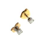 Pair of 9ct gold mounted diamond stud earrings, 0.64g approx gross Condition: