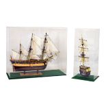 Cased scale model of the tall masted ship 'Endeavour' within five sided Perspex case on green