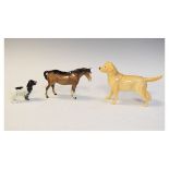 Beswick figure of a Golden Labrador 'Soloman of Wendover', No.1548, a Beswick figure of a brown