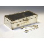 George V silver cigarette box of rectangular form, the hinged cover with engine turned decoration