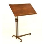Draughtsman's oak easel with inclining rectangular top, on two tubular supports and tripod base with