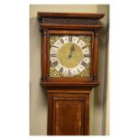 Inlaid walnut cased longcase clock, the 24cm brass dial having silvered chapter ring bearing the
