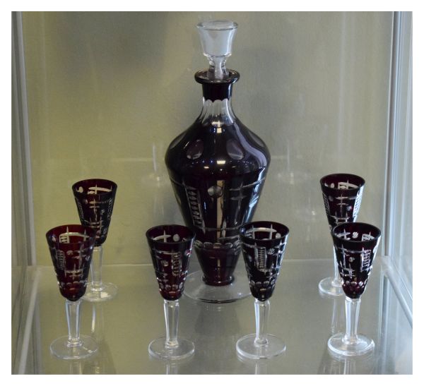 Bohemian ruby flash cut glass liqueur set comprising: baluster shaped decanter and stopper and six