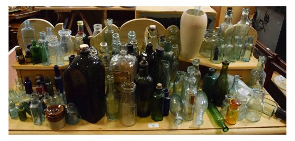 Large selection of glass bottles to include; four tapering square Dutch examples, assorted codd