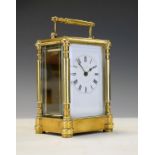 Late 19th/early 20th Century French brass carriage clock, the white enamel dial with Roman numerals,