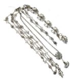 Long white metal fancy link necklace, a similar shorter necklace, a somewhat similar bracelet and