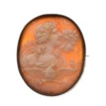 19th Century carved shell cameo brooch decorated with a classical male and female with an owl and