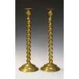 Pair of early 20th Century brass barley twist candlesticks, 43.5cm high Condition: