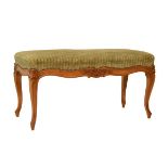 Early 20th Century French carved fruitwood duet stool or window seat, the upholstered rectangular