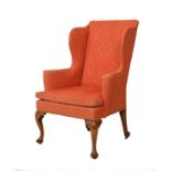 George III fruitwood wing armchair, the flat stuff over back between shaped wings and integral out