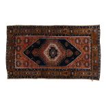 Mid 20th Century Middle Eastern prayer rug, the terracotta field decorated to each end with