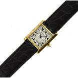 Cartier - Lady's 18ct gold Tank Quartz wristwatch, the signed champagne dial with Roman numerals,