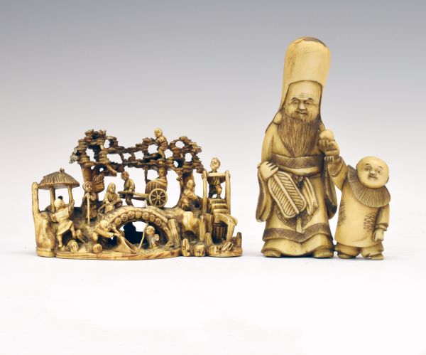 Small late 19th Century Chinese carved ivory group depicting a rural scene with a bridge over a