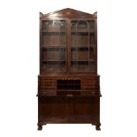 Early 19th Century inlaid mahogany secretaire bookcase, the upper section with pointed pediment